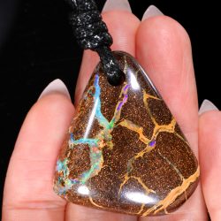103ct-drilled-boulder-opal-pendant-large-rainbow-lightning-pattern