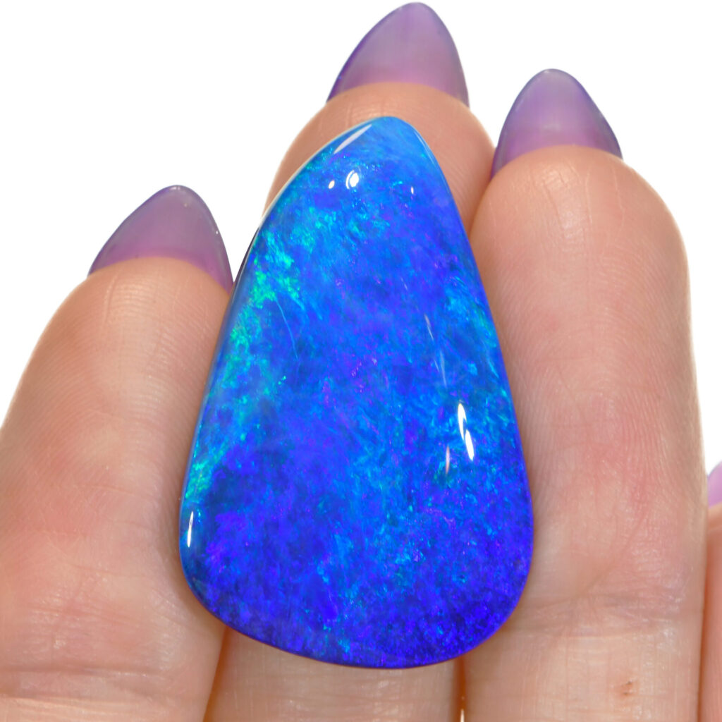 Boulder Opal 25.66 ct Beautiful Blue Green Fire Boulder Opal. 100% Natural Solid Untreated Genuine Boulder Opal Loose Stone From Winton, Queensland, Australia. Freeform Shape, Well Polished Smooth Surface.