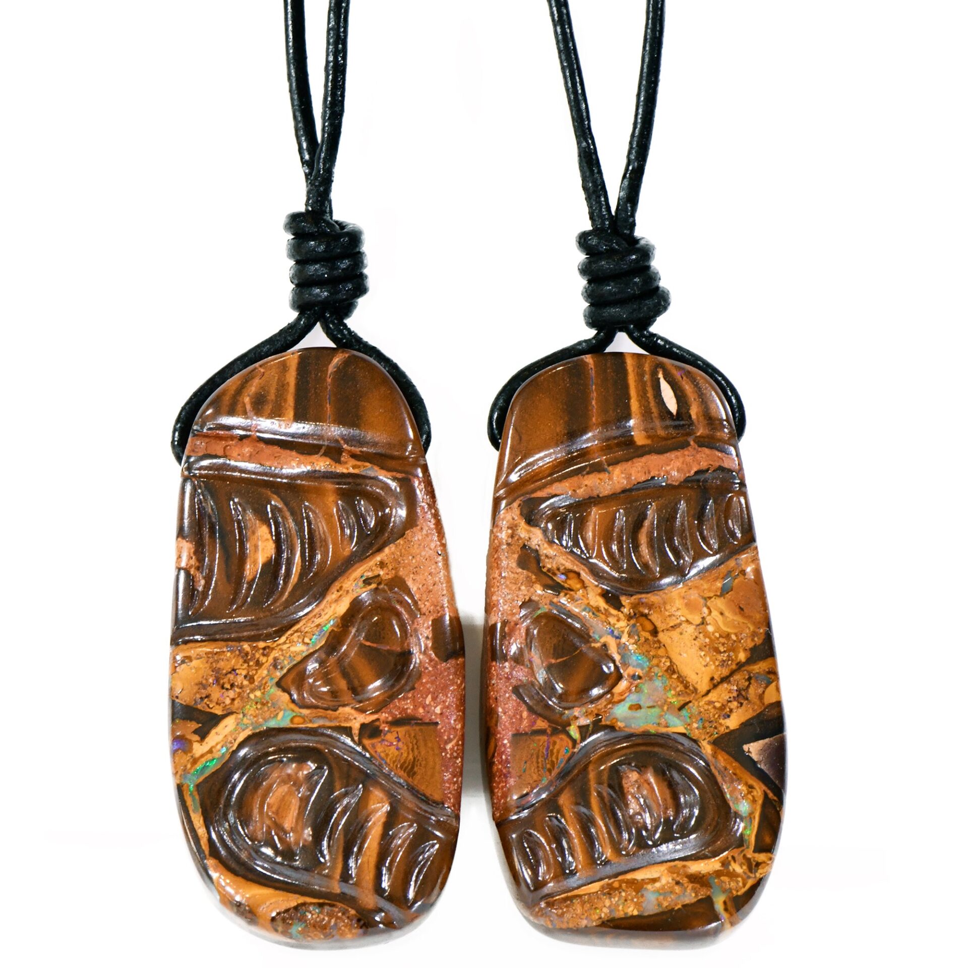Set of 2 Matching Boulder Opal Pendants Hand Carved Mauri Voodoo Face Design with genuine adjustable leather necklace