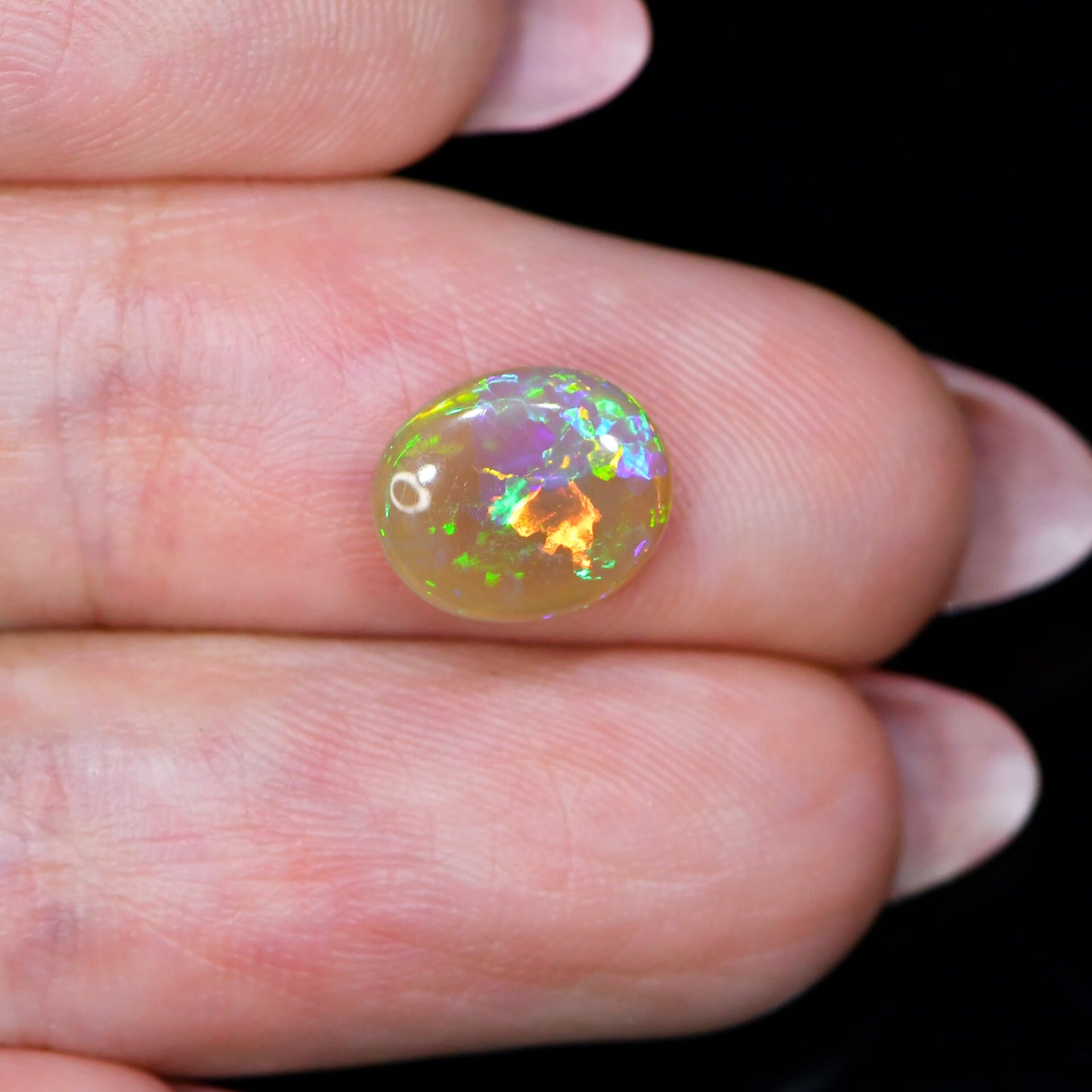 Multi Color Oval Black Crystal Opal 1.2 ct