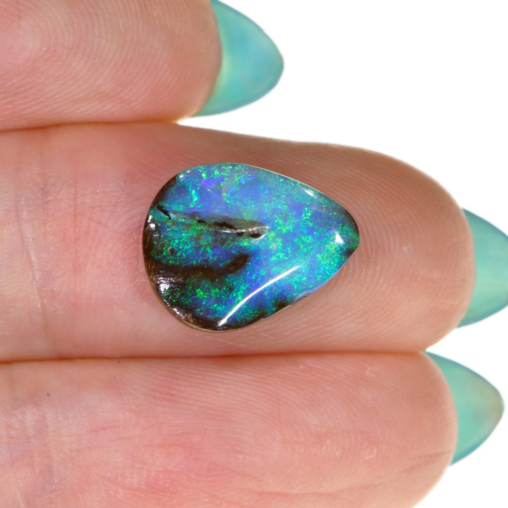 Aqua Blue Queensland Boulder Opal Teardrop Ringstone 3.7 ct angled view Australian opal gemstone Opal Galaxy product image