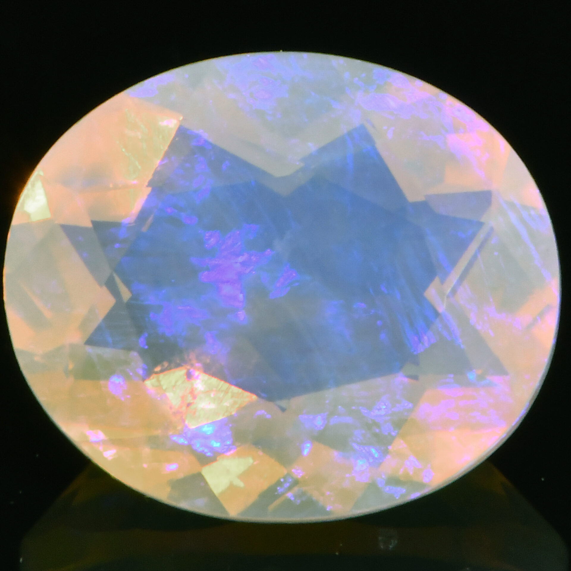 1.79ct Natural Faceted Opal Oval Cut with Blue and Pastel Fire from Andamooka, Australia