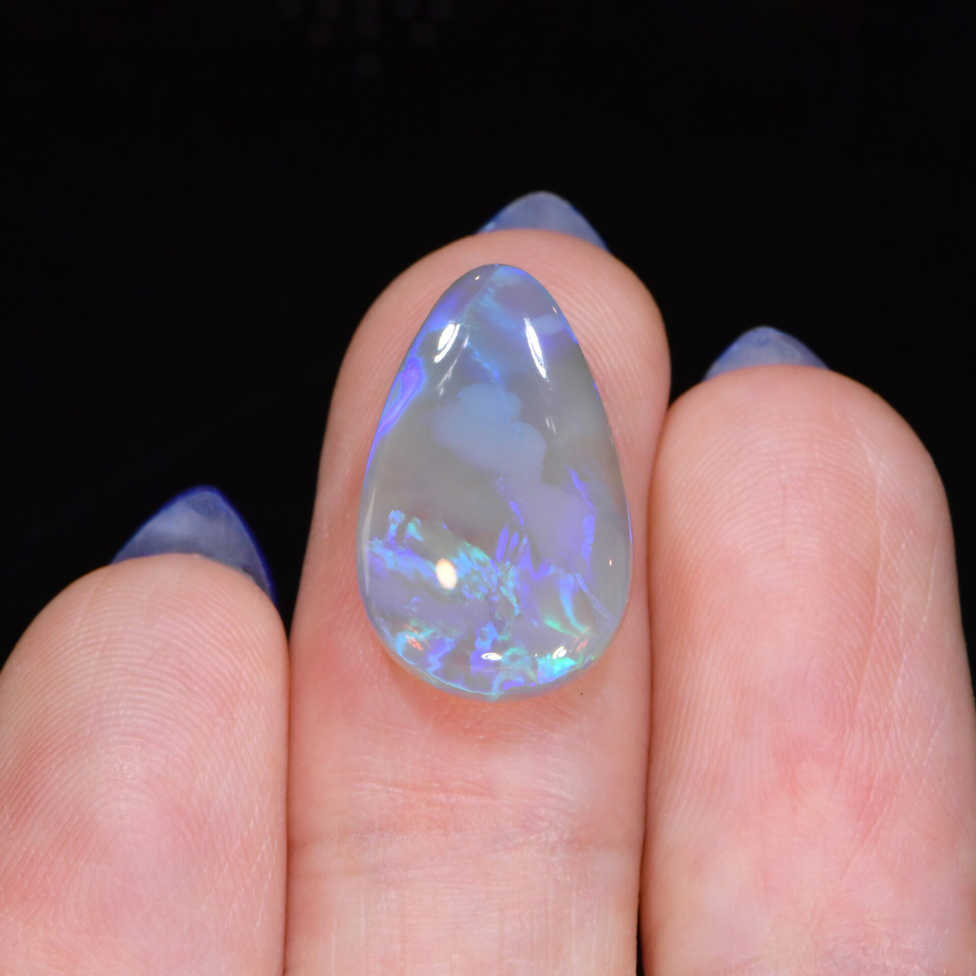 Teardrop Dark Crystal Opal 4.98 ct-hand shot
