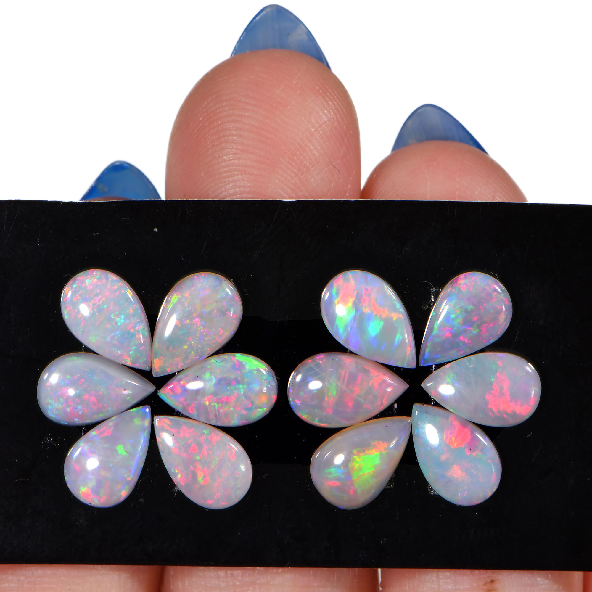 12 Pcs Calibrated Teardrop Shape Crystal Opal Parcel 5.32 ctw-hand shot