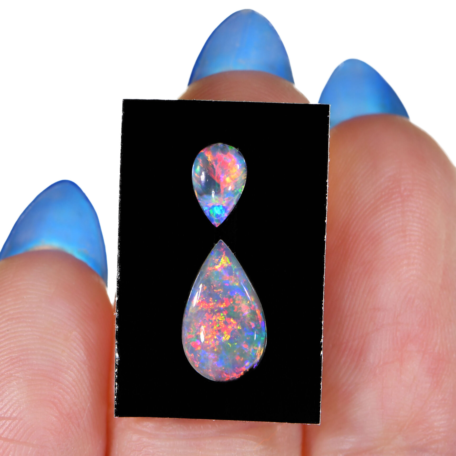 2 Pcs Calibrated Teardrop Shape Crystal Opal Parcel 1.16 ctw-hand shot 1