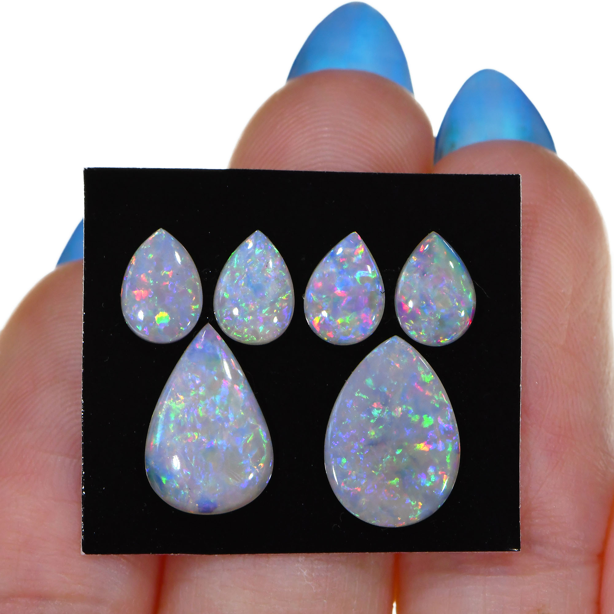 6 Pcs Calibrated Teardrop Shape White Opal Parcel 2.41 ctw-hand shot 1