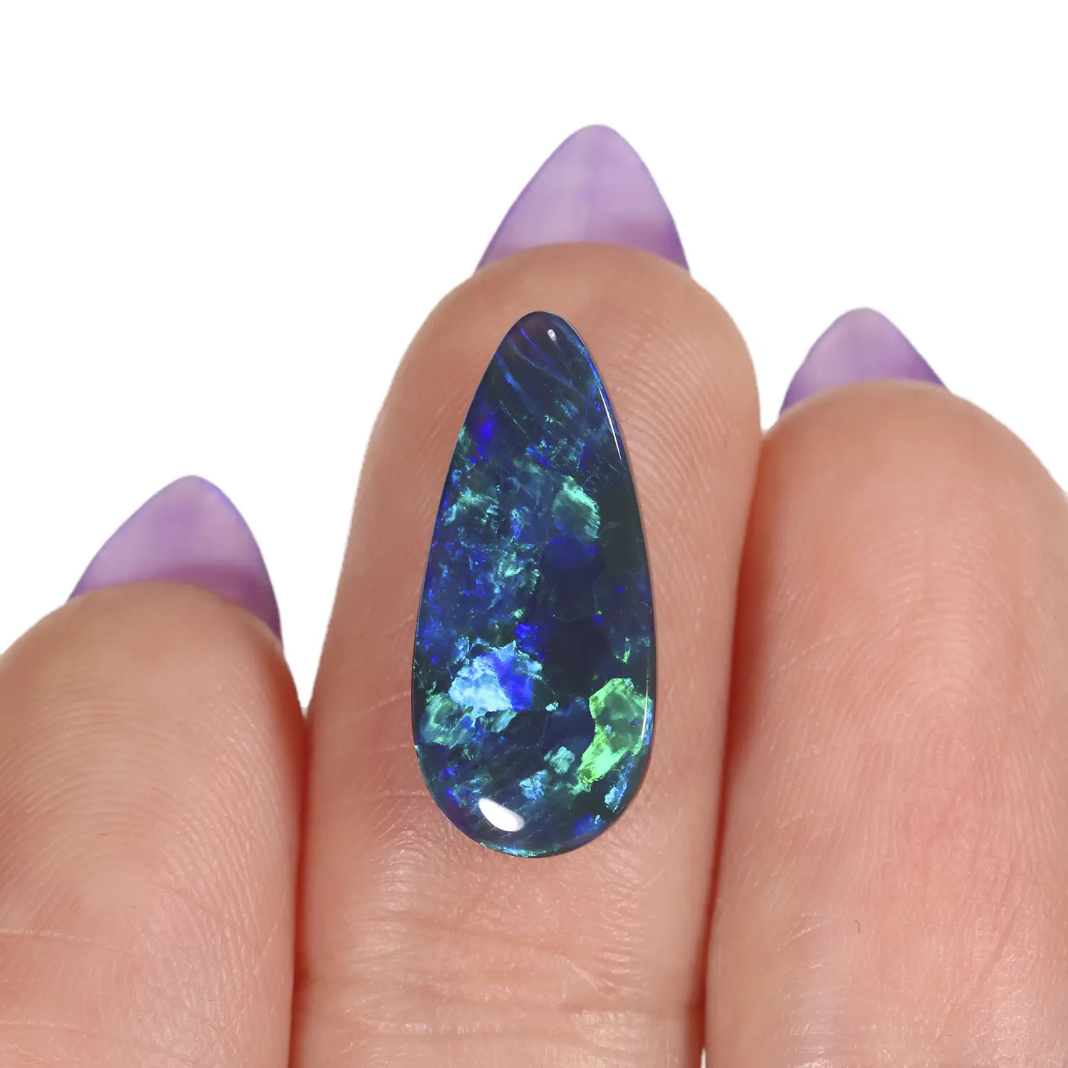 2.84ct solid black opal teardrop cabochon resting across fingers, displaying bold green and blue play-of-colour with large crystal patterning on a dark body, Lightning Ridge Australia