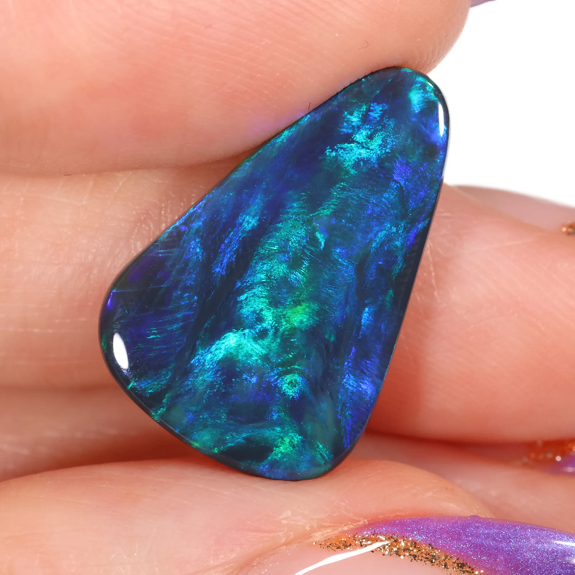 Black Opal – 5.24 ct Green Blue Ring Stone - hand shot