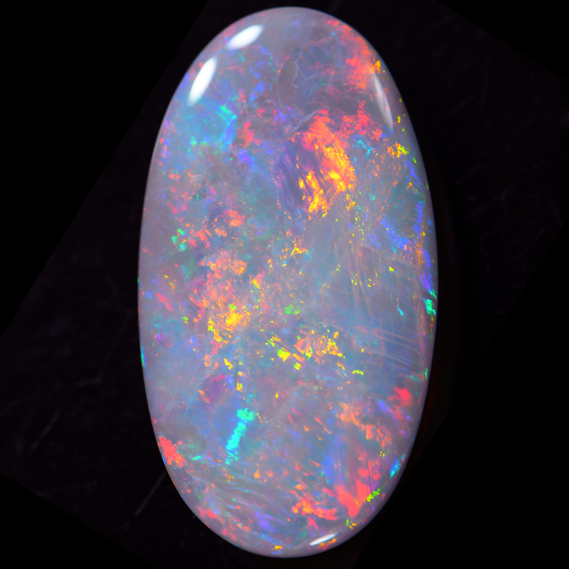 20.6ct Natural Dark Opal with Striking Play-of-Color, Lightning Ridge Australian Gemstone, Oval Cut for Collectors and Fine Jewelry.