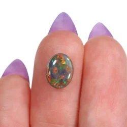 Dark Opal - 1.6 ct Orange Yellow Natural Australian Stone - hand shot