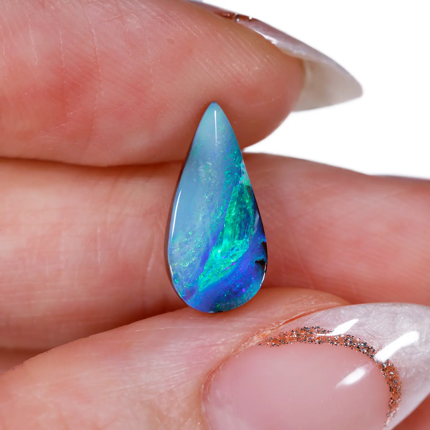 Natural Blue Green Boulder Opal 2.58 ct-hand shot