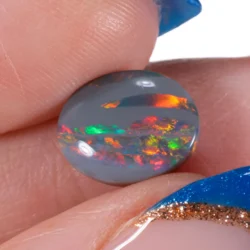 1.97ct Natural Dark Opal Rainbow Fire-hand shot