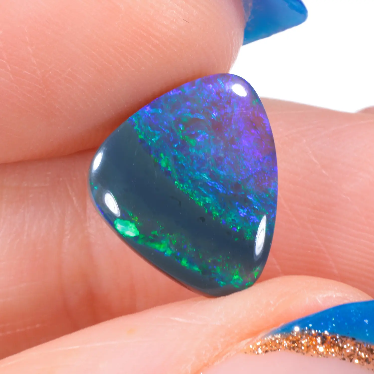 2.8ct Natural Australian Black Opal-hand shot