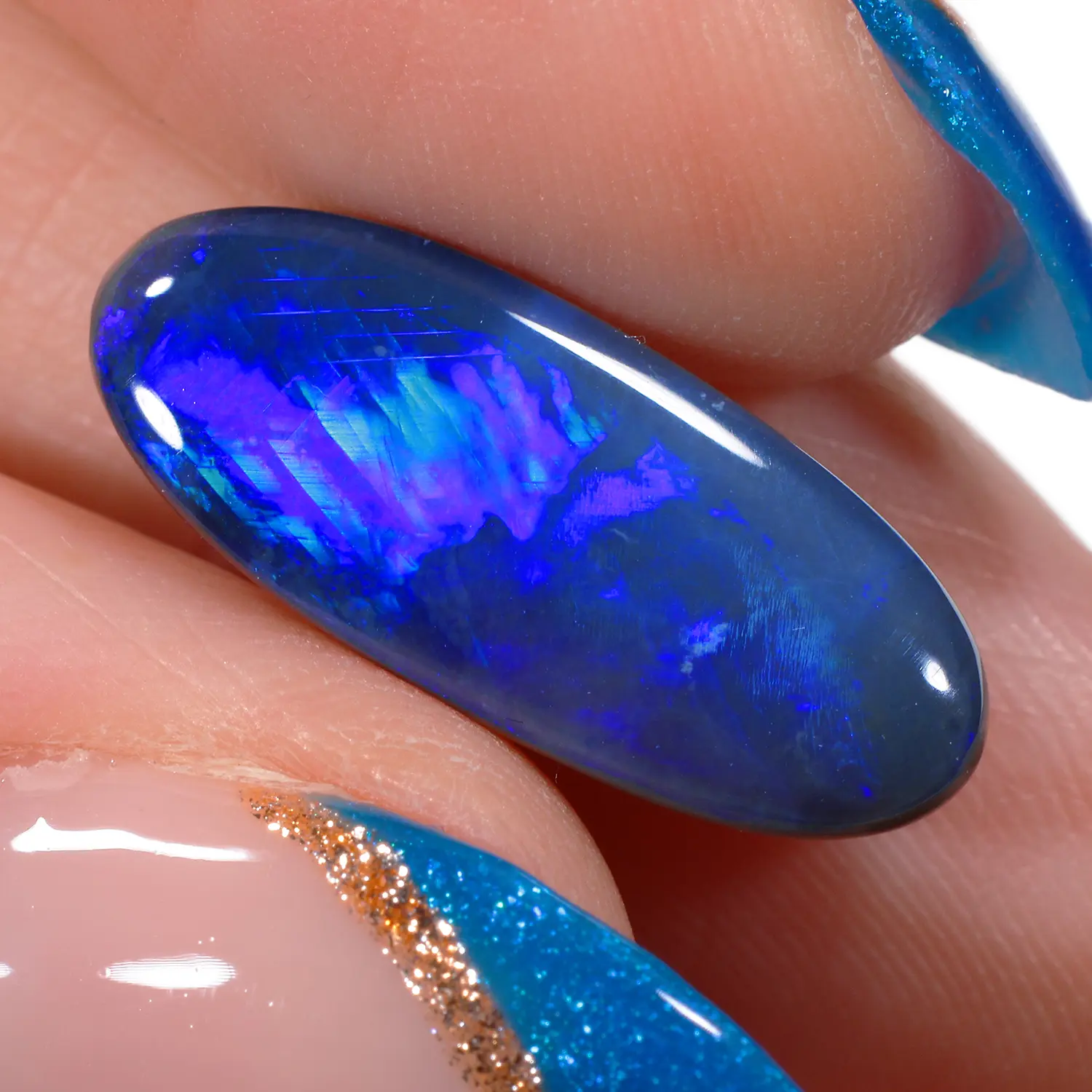 4.63ct Natural Black Opal Oval Cut Blue Green-hand shot1