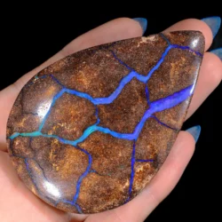 434.5ct Massive Teardrop Boulder Opal Vein Specimen-hand shot