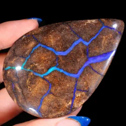 434.5ct Massive Teardrop Boulder Opal Vein Specimen-hand shot1