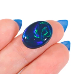 8.71ct Natural Black Opal Chinese Writing Pattern - hand shot4