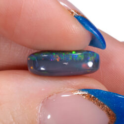 4.56ct Top-Grade Natural Black Opal Oval Cut with Intense Multicolor Play-of-Color from Lightning Ridge, Australia. side b