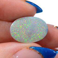 7.3ct Natural Dark Opal Oval Multicolor Pinfire Pattern from Lightning Ridge, Australia.