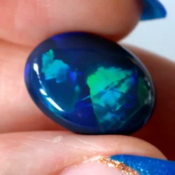 8.71ct Natural Black Opal Chinese Writing Pattern - No Light Inside Room