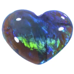 1.11ct solid black crystal opal heart on white background, displaying striking electric green and blue play-of-colour with feather harlequin patterning across a dark translucent body, Lightning Ridge Australia