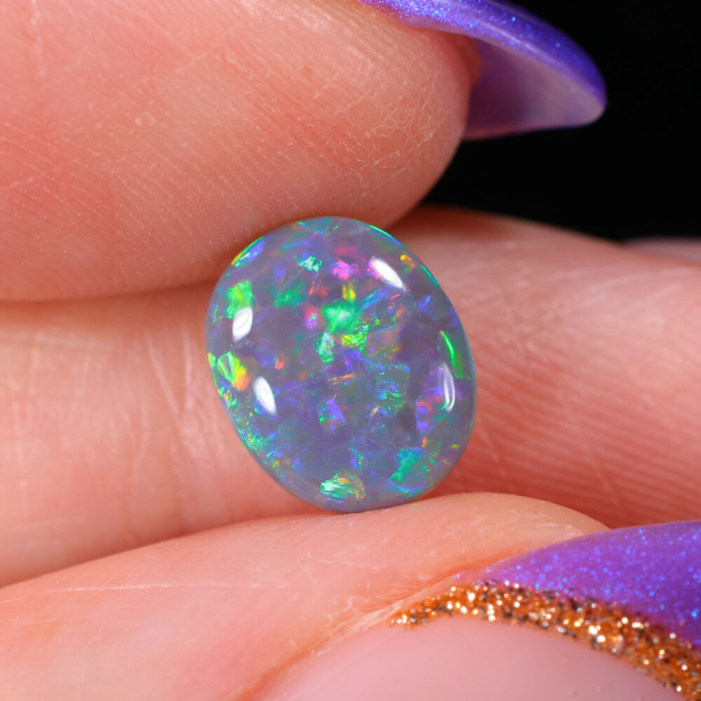 1.82ct Australian Natural Dark Opal - Rainbow Floral Pattern - hand shot1