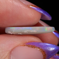 4.05ct Natural Dark Opal -Teardrop Rainbow Fire - side shot