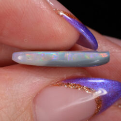 4.05ct Natural Dark Opal -Teardrop Rainbow Fire - side shot1