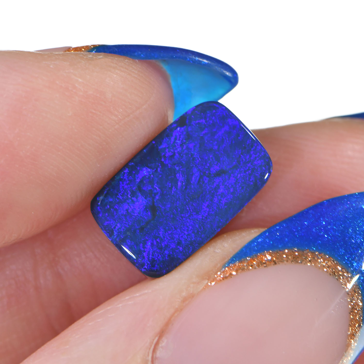 4.5ct Rectangle Shape Blue Black Opal-hand shot