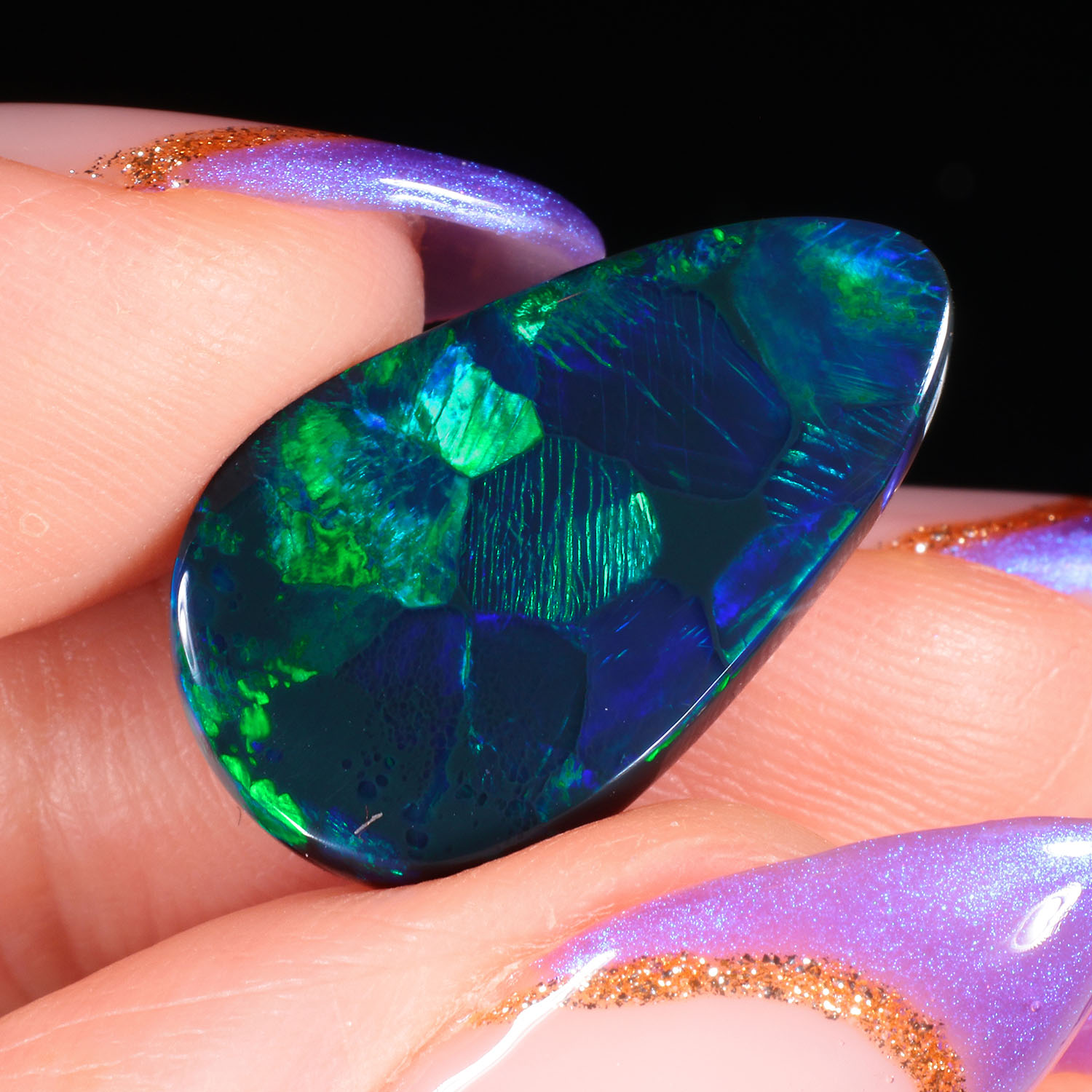 7.25ct Natural Black Opal -Teardrop Blue Green Fire - hand shot1