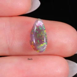 2.12ct Natural Black Crystal Opal Neon Fuchsia Rainbow Fire-back shot