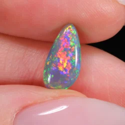 2.12ct Natural Black Crystal Opal Neon Fuchsia Rainbow Fire-hand shot