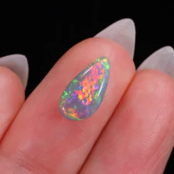 2.12ct Natural Black Crystal Opal Neon Fuchsia Rainbow Fire-hand shot2