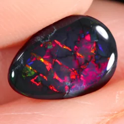 1.98ct Solid Black Opal Teardrop Red Orange Green Fire-hand shot1 xx1880