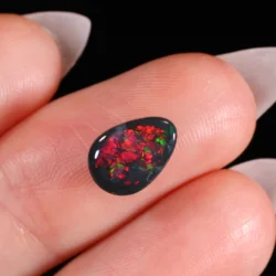 1.98ct Solid Black Opal Teardrop Red Orange Green Fire-hand shot5 xx1880