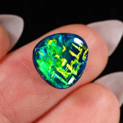 Different angle showing gold script pattern glowing under bright light