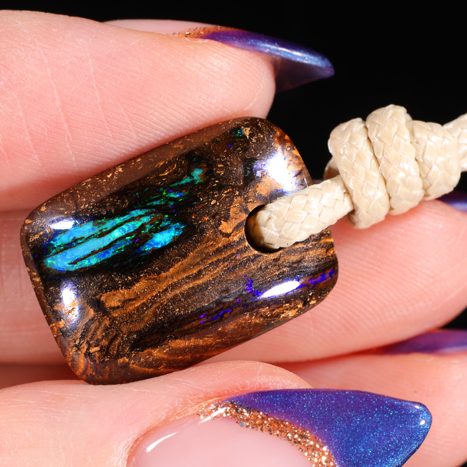 27ct Solid Boulder Opal Pendant Blue Green Fire angled view Australian opal gemstone Opal Galaxy product image