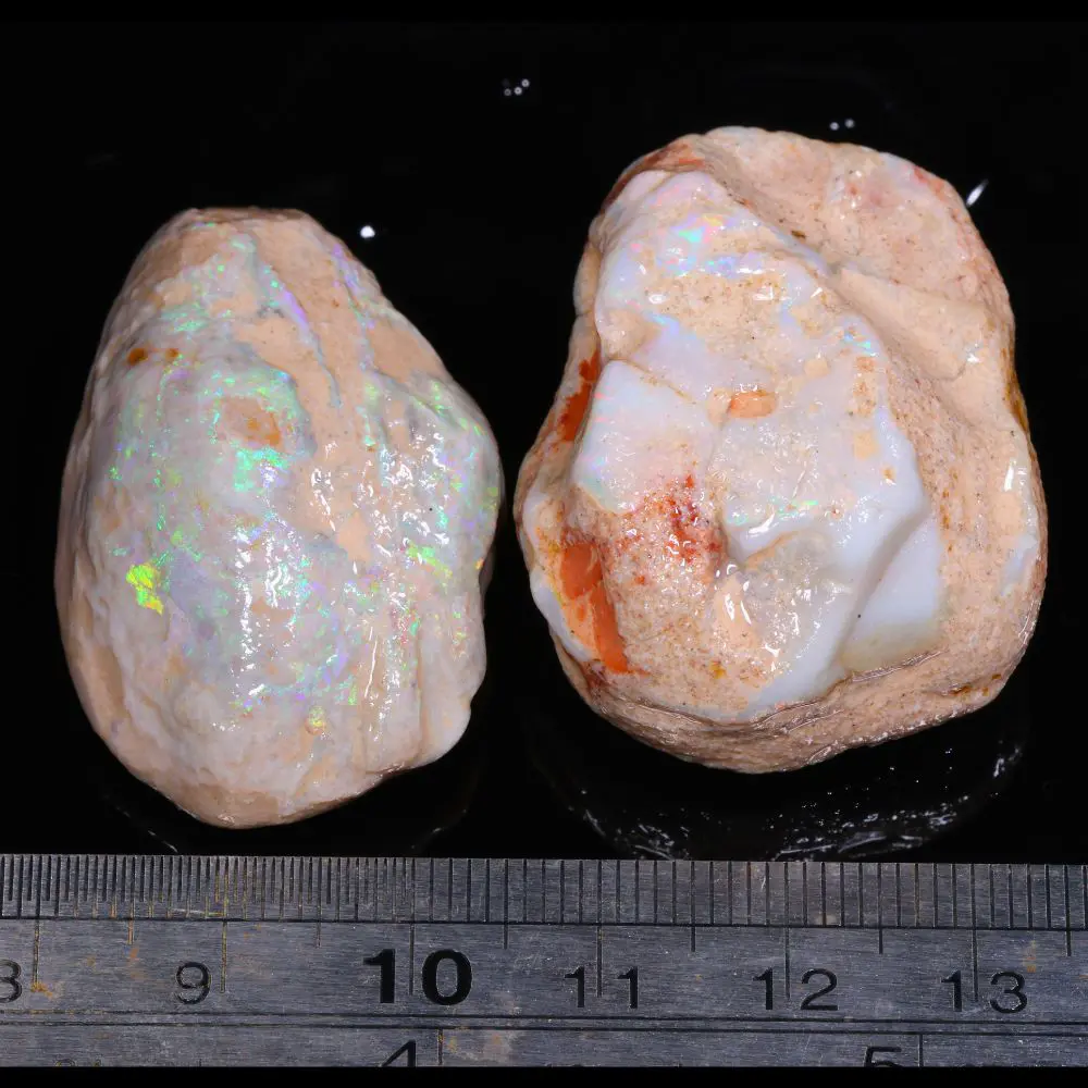 Natural Lightning Ridge shell opal rubs displaying soft green and multicolor flashes in white opal base material