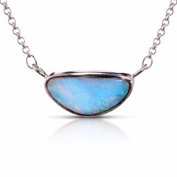 24.7ct Winton boulder opal pendant with ocean blue green fire set in sterling silver shown on white background with reflection.