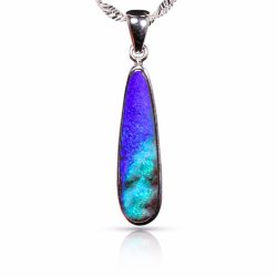 Elongated teardrop shaped Australian boulder opal pendant with vibrant blue purple color