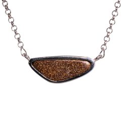 Back view of forest green boulder opal pendant 25.5ct showing natural ironstone backing and silver bezel horizontal style.