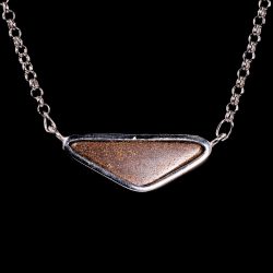 Back view of boulder opal pendant 25.6ct showing natural ironstone backing and silver bezel setting horizontal style.