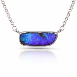 Front view of royal blue ironstone boulder opal pendant 24.5ct on adjustable silver chain with vibrant blue fire.