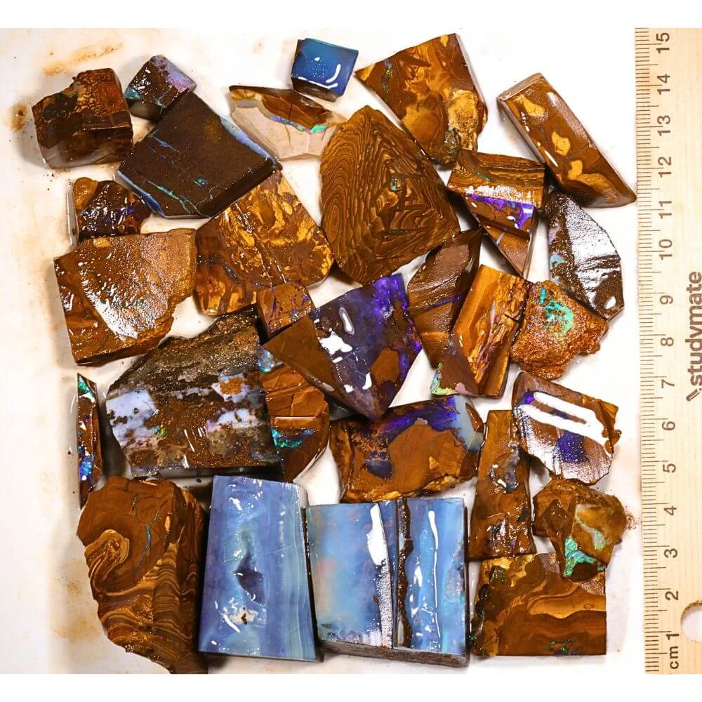 437g boulder opal rubs parcel from Winton, Australia showing purple, blue, and lavender color play through natural ironstone matrix. 100% natural and untreated.