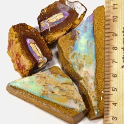 104g boulder opal splits parcel from Queensland, Australia showing Koroit nut concentric banding and pipe crystal opal with pastel green and pink fire. 100% natural and untreated.