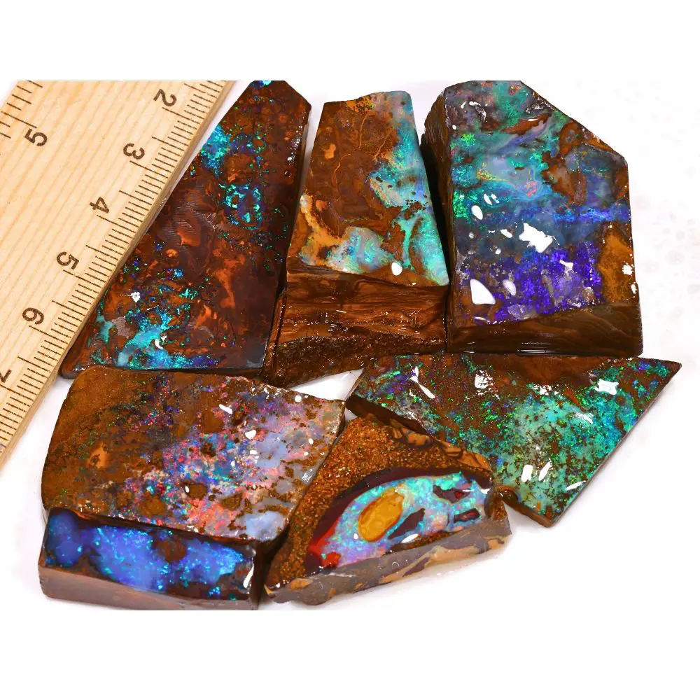 133g boulder opal rubs pendant parcel from Winton, Australia showing vivid green, teal, and purple color play through natural ironstone matrix. 100% natural and untreated.