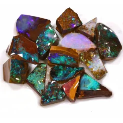 205ct boulder opal rubs rough ringstone parcel of 15 pieces from Winton, Australia with green, teal, purple, and pink fire through natural ironstone matrix. Natural, untreated.