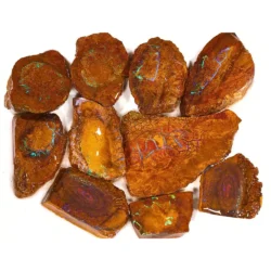 293g Koroit boulder opal matrix rubs rough parcel of 10 pieces from Queensland, Australia with golden amber ironstone, teal veining, and purple concentric ring patterns. Natural, untreated.