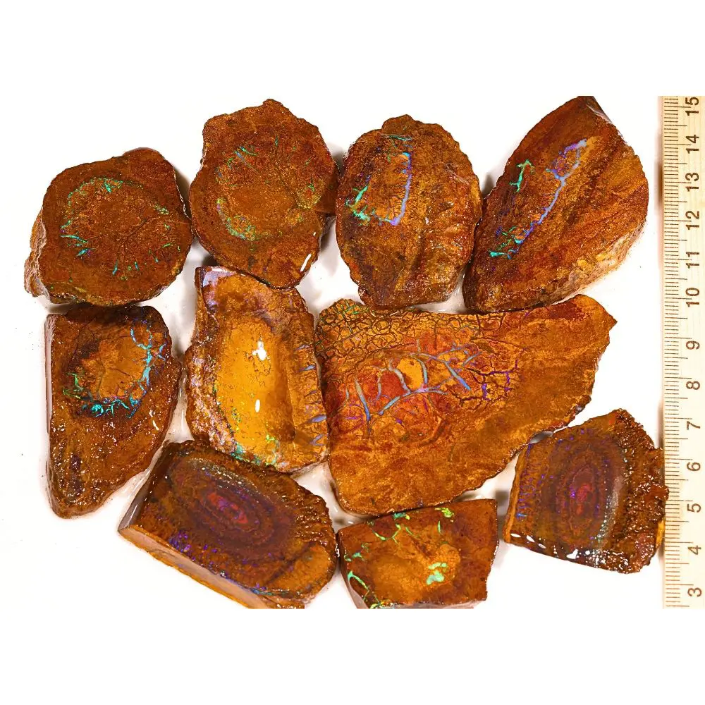 293g Koroit boulder opal matrix rubs parcel from Queensland, Australia showing warm golden amber ironstone with natural web patterns and teal opal veining. 100% natural and untreated.