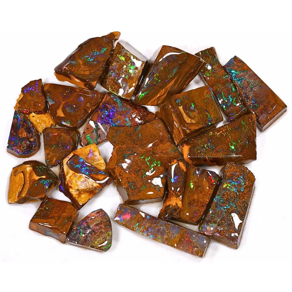 470ct rainbow boulder opal matrix rubs rough parcel of 20 pieces from Winton, Australia with full spectrum multicolor pinfire through natural ironstone matrix. Natural, untreated.